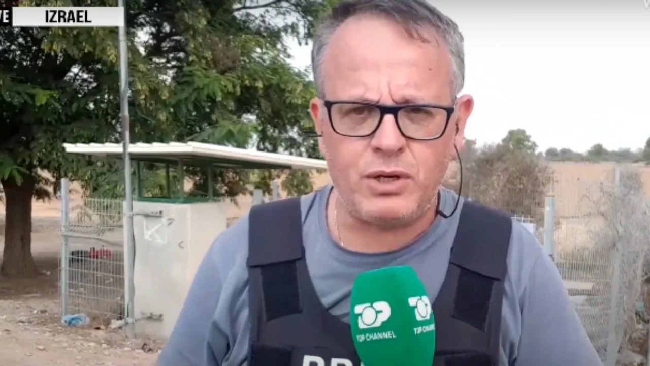 Momenti i frikshëm kur gazetarit të Top Channel i rrezikohet jeta në frontin e parë në Izrael, i drejtohet arma për ta vrarë